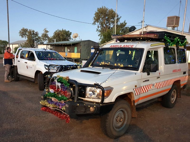 Warren Kenney with the CDRC vehicle and the Atitjere ambulance.