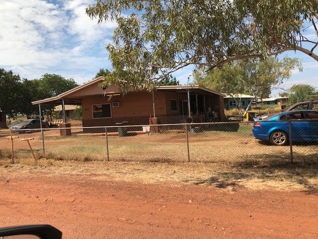 Lot 342 gets a special mention from Lajamanu Community Services Manager Peter van Heusden due to the Adelaide Crows banner in the front window.