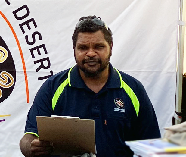 Sean Wilson on the CDRC stall at the Yuendumu Careers Expo. 