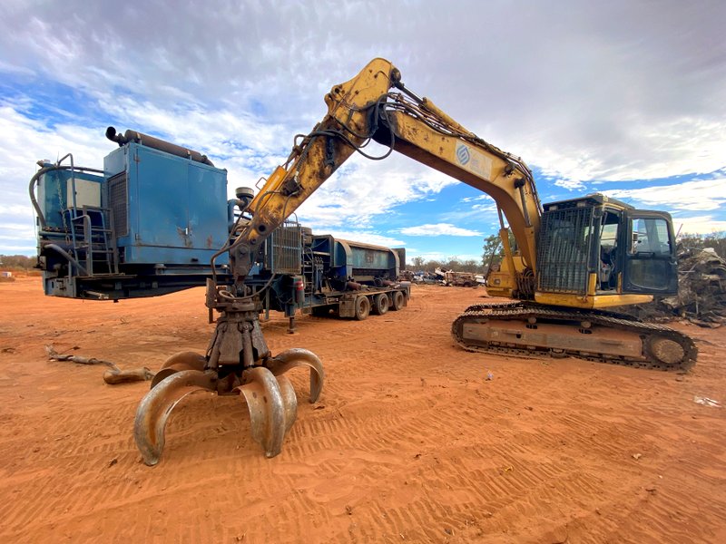 Car baler and excavator