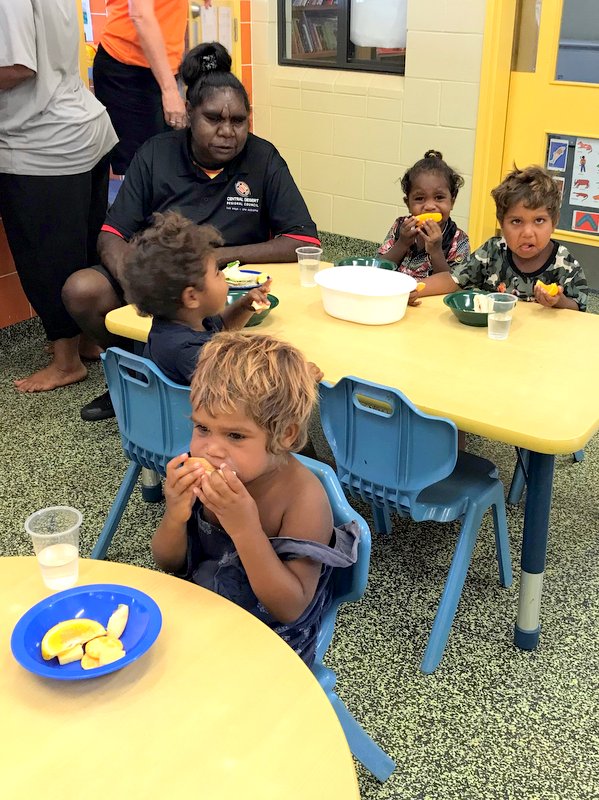 Children enjoying morning tea at Nyirripi Childcare reopening