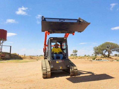 David Rankine testing out the new skid steer.