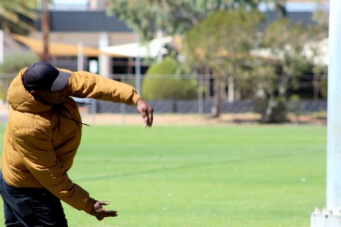 Cliffy Tommy practicing bowling in the cricket training.